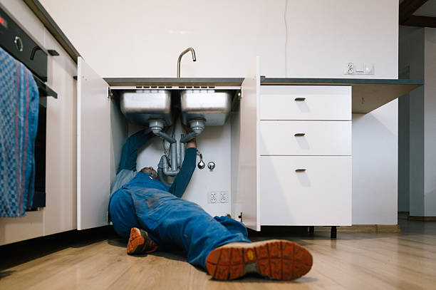 Professional Plumbing technician working in Abington, MA